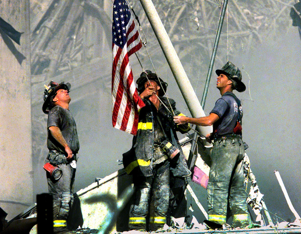 Firemen Raising Flag